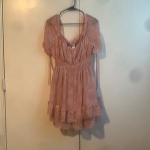 Light pink dress with little flowers and a stretchy waist band